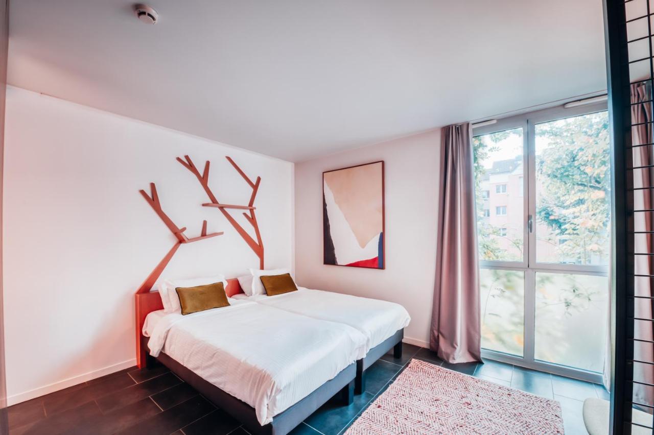 Cowool Cergy Aparthotel Exteriör bild