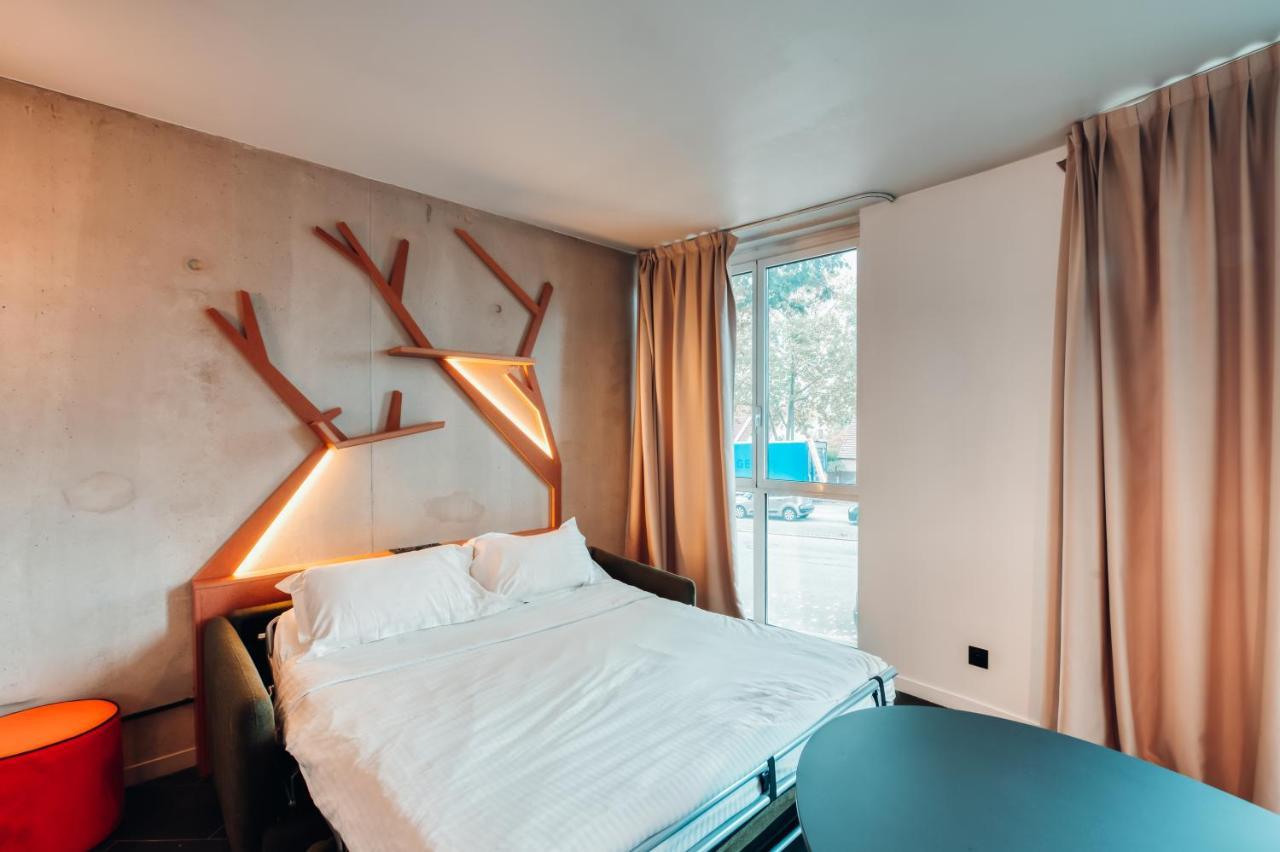 Cowool Cergy Aparthotel Exteriör bild