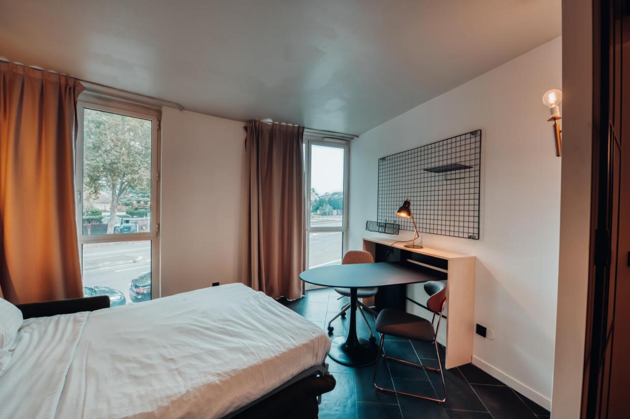 Cowool Cergy Aparthotel Exteriör bild
